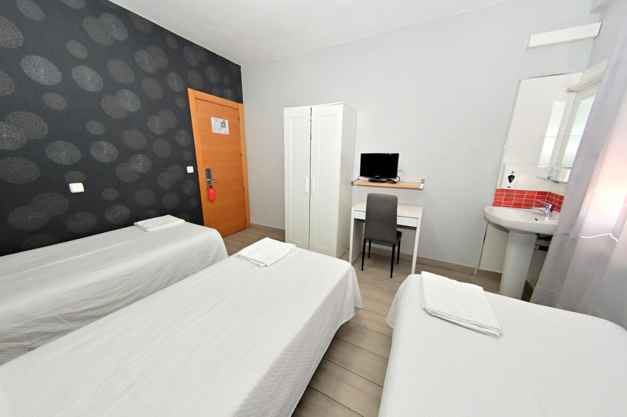 Double or Twin Room with Extra Bed and Shared Bathroom